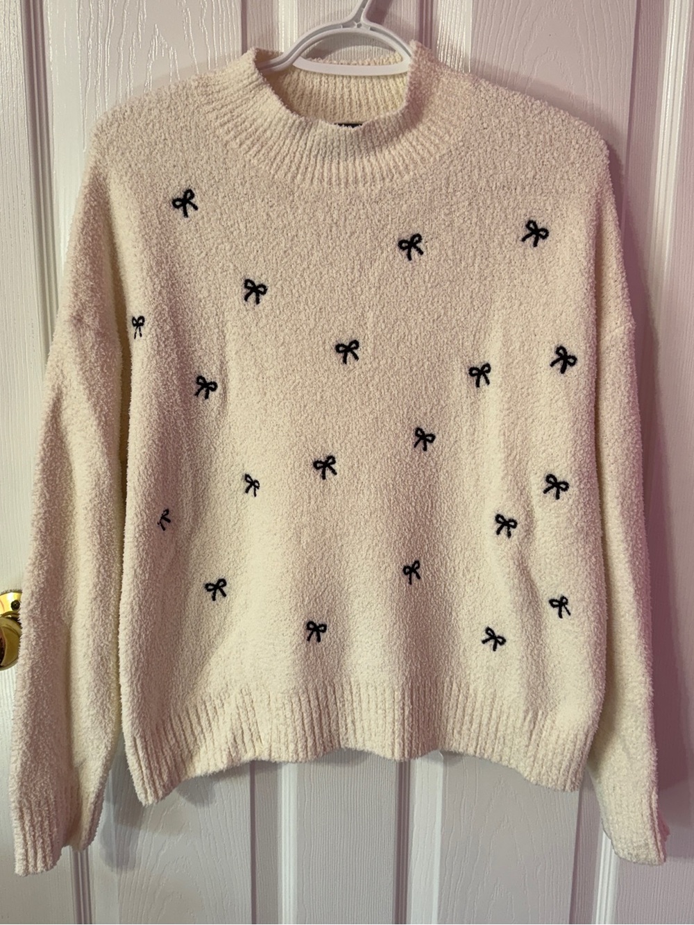 Belldini Cream Sweater with Black Bow Embroidery